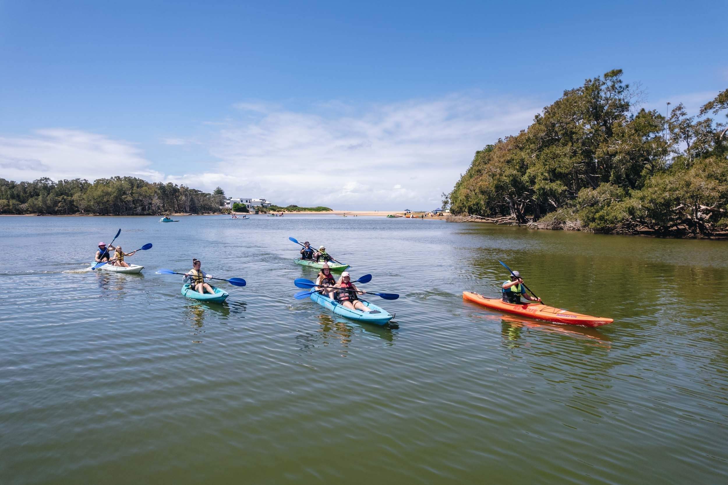 eco certified kayakers on lake
