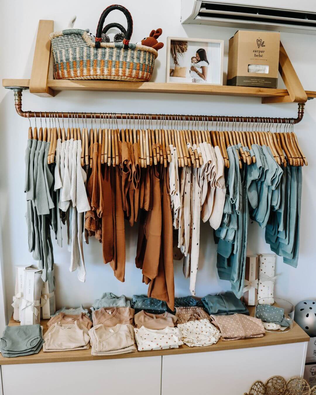 assortment of kids clothing on racks