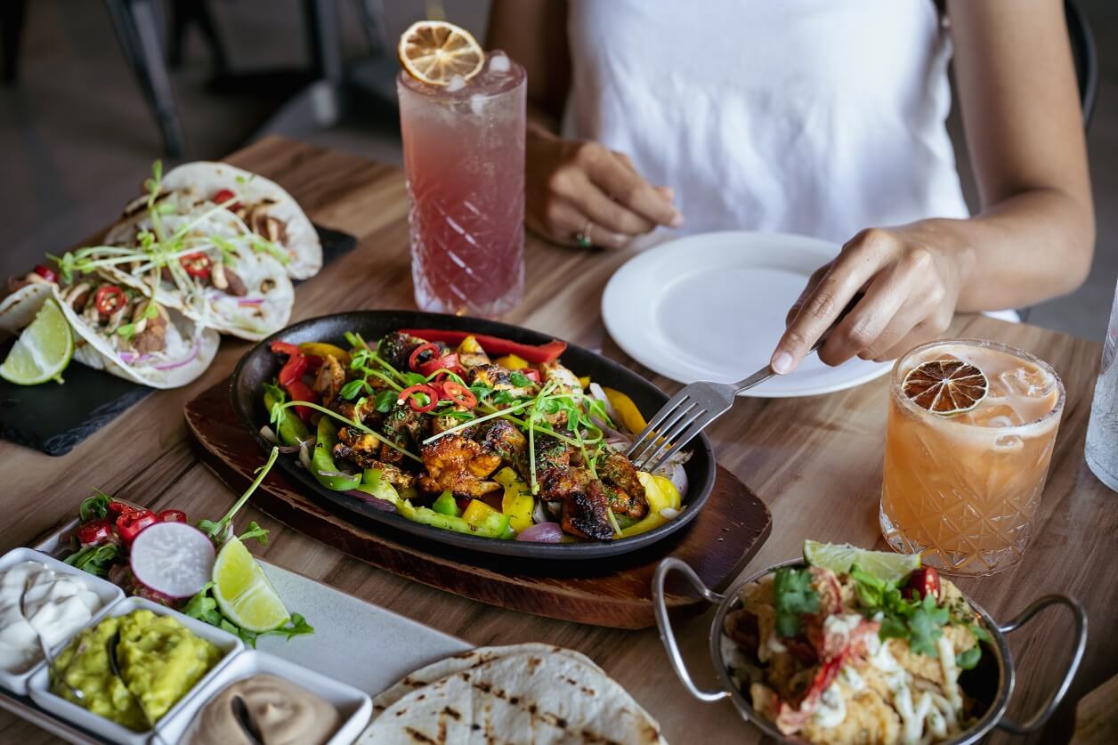 Platters of food on a table in a Central Coast eatery