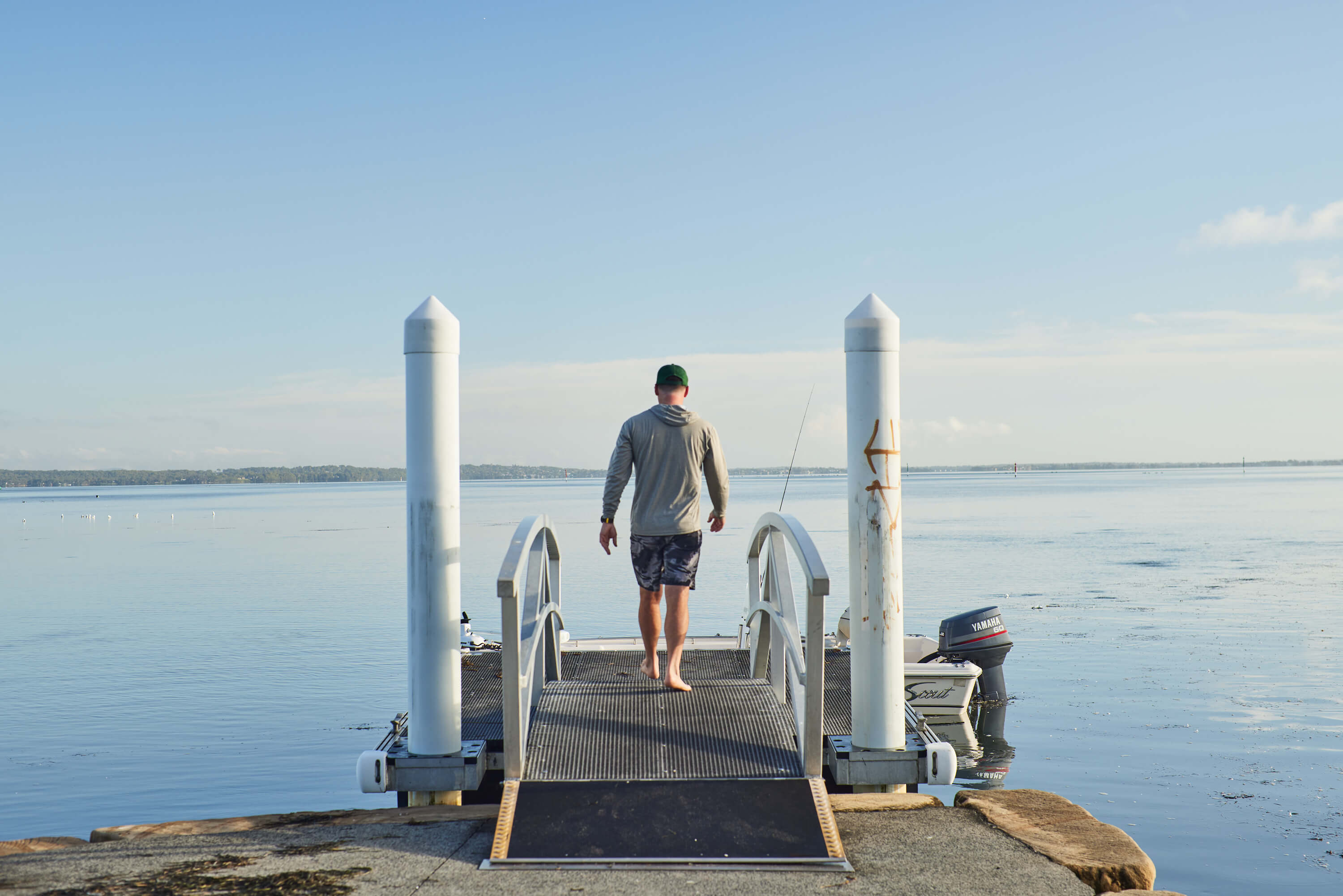 man on boat ramp