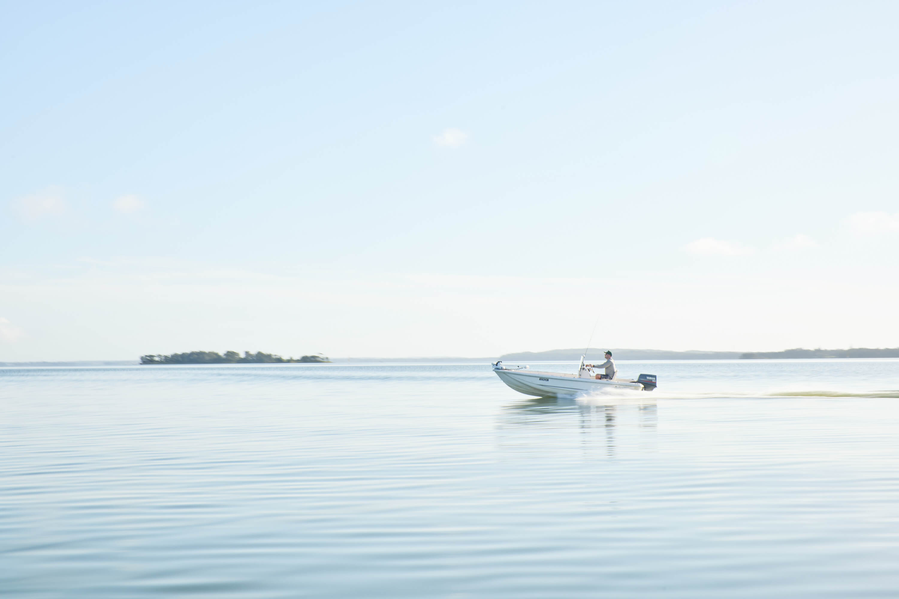 boating man on lake