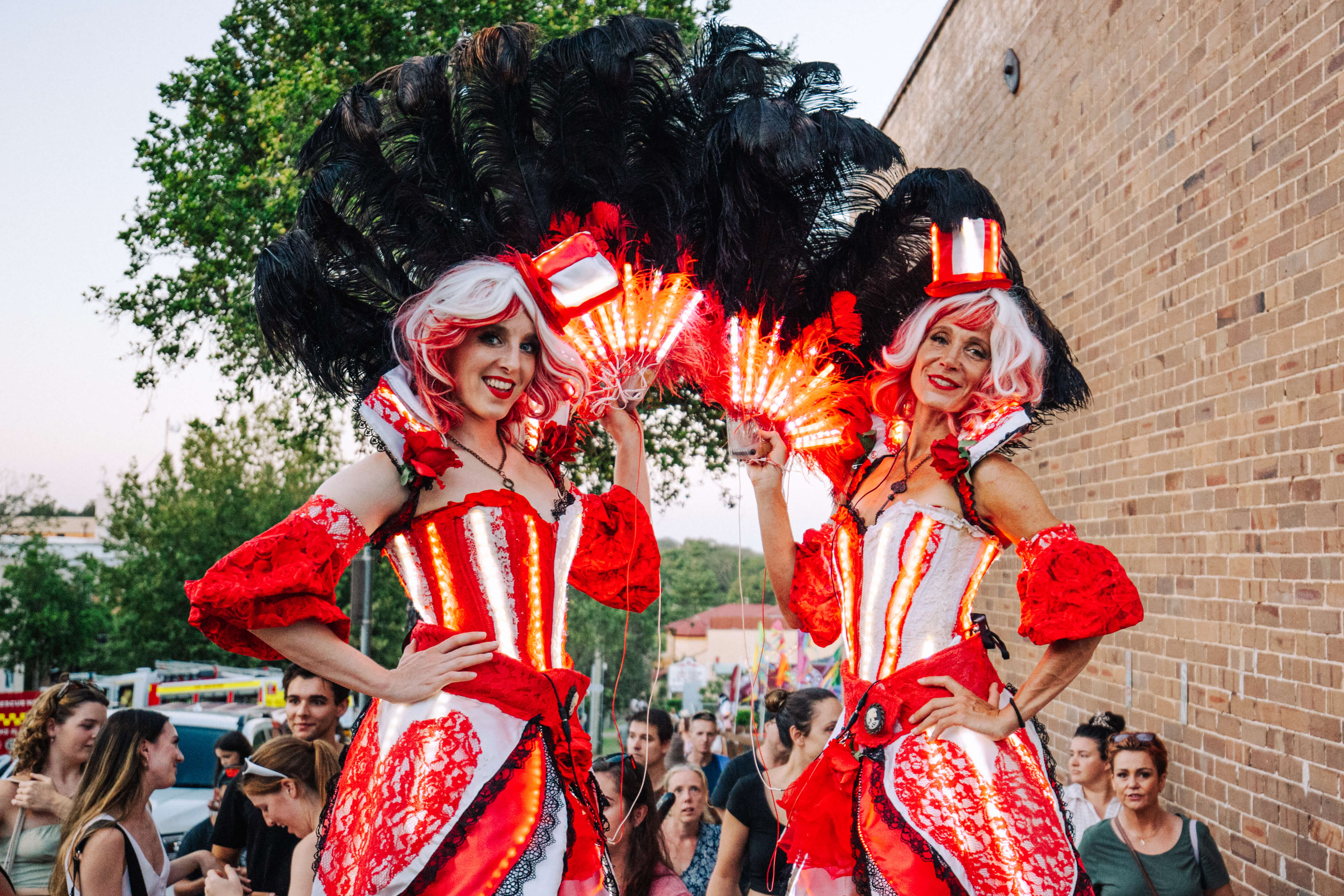 Street performers in red