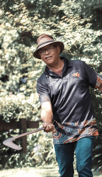 aboriginal elder throwing boomerang