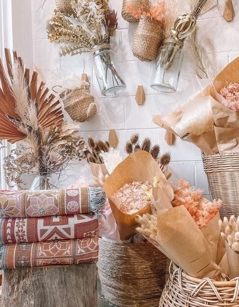 assortment of dried flowers and picnic rugs