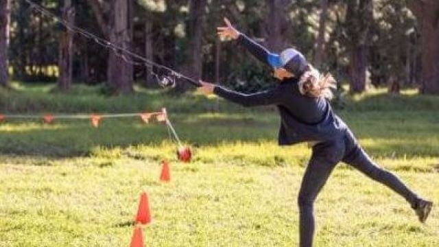Lady throwing a fishing line