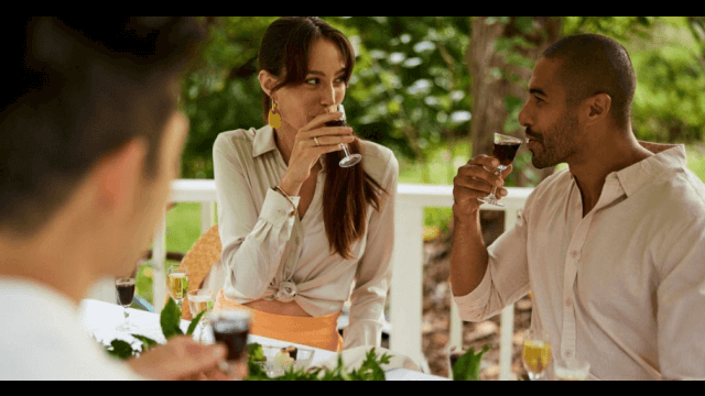 couple sipping fruit wine