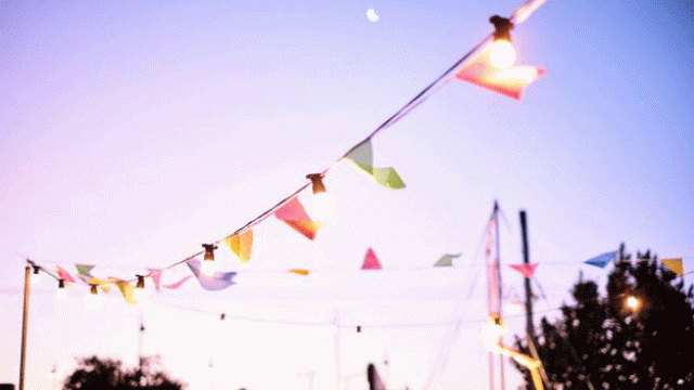 Festival flags with moon in background