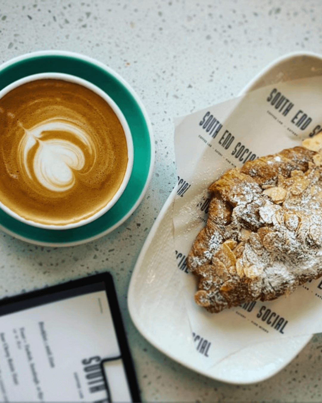 flat white and almond croissant