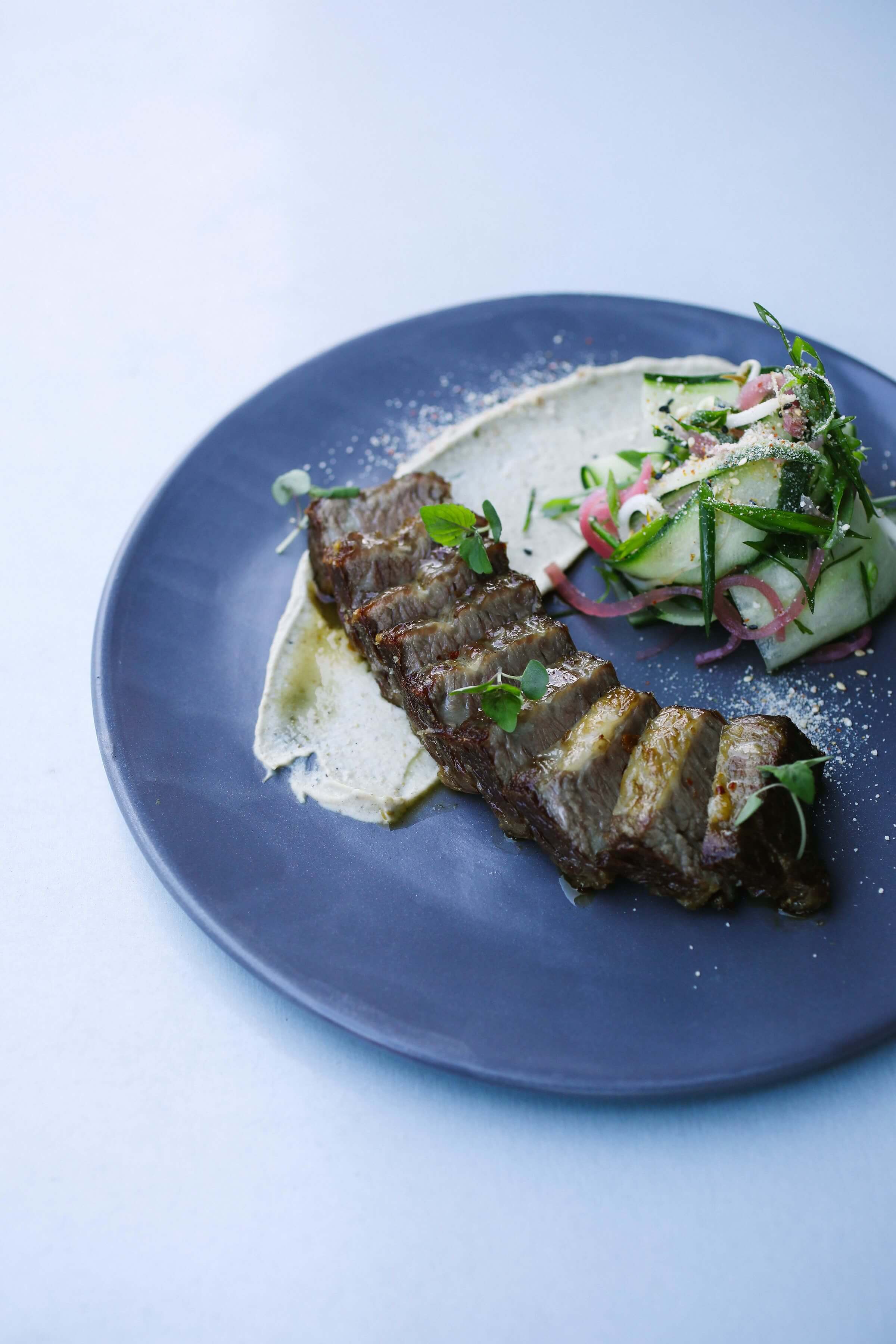 plate of fancy asian australian sliced cuisine