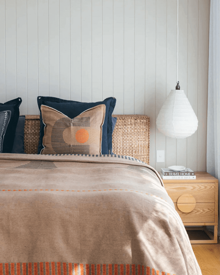 Bed with navy cushion