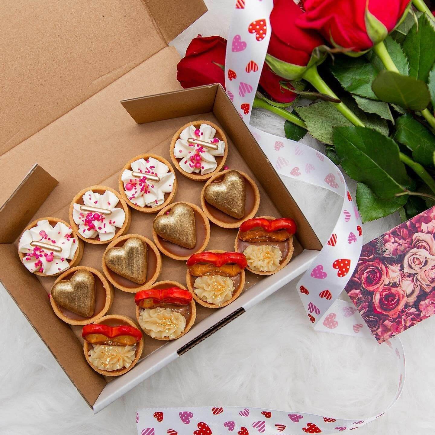 Box of tarts and red roses