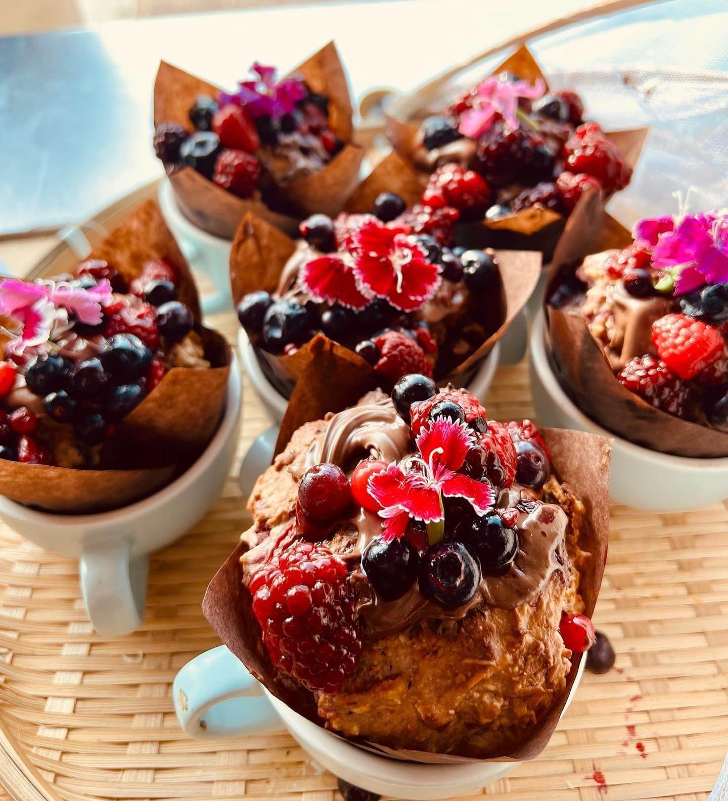 Chocolate muffins with berries on top