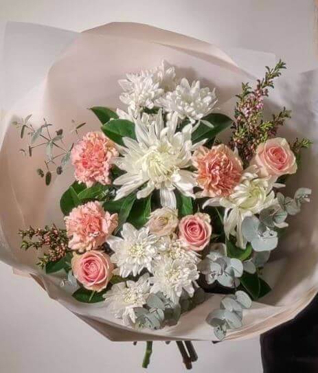 Gorgeous soft and delicate simply stunning design. Featuring lush Viburnum, roses, Disbuds, roses and Eucalyptus gum