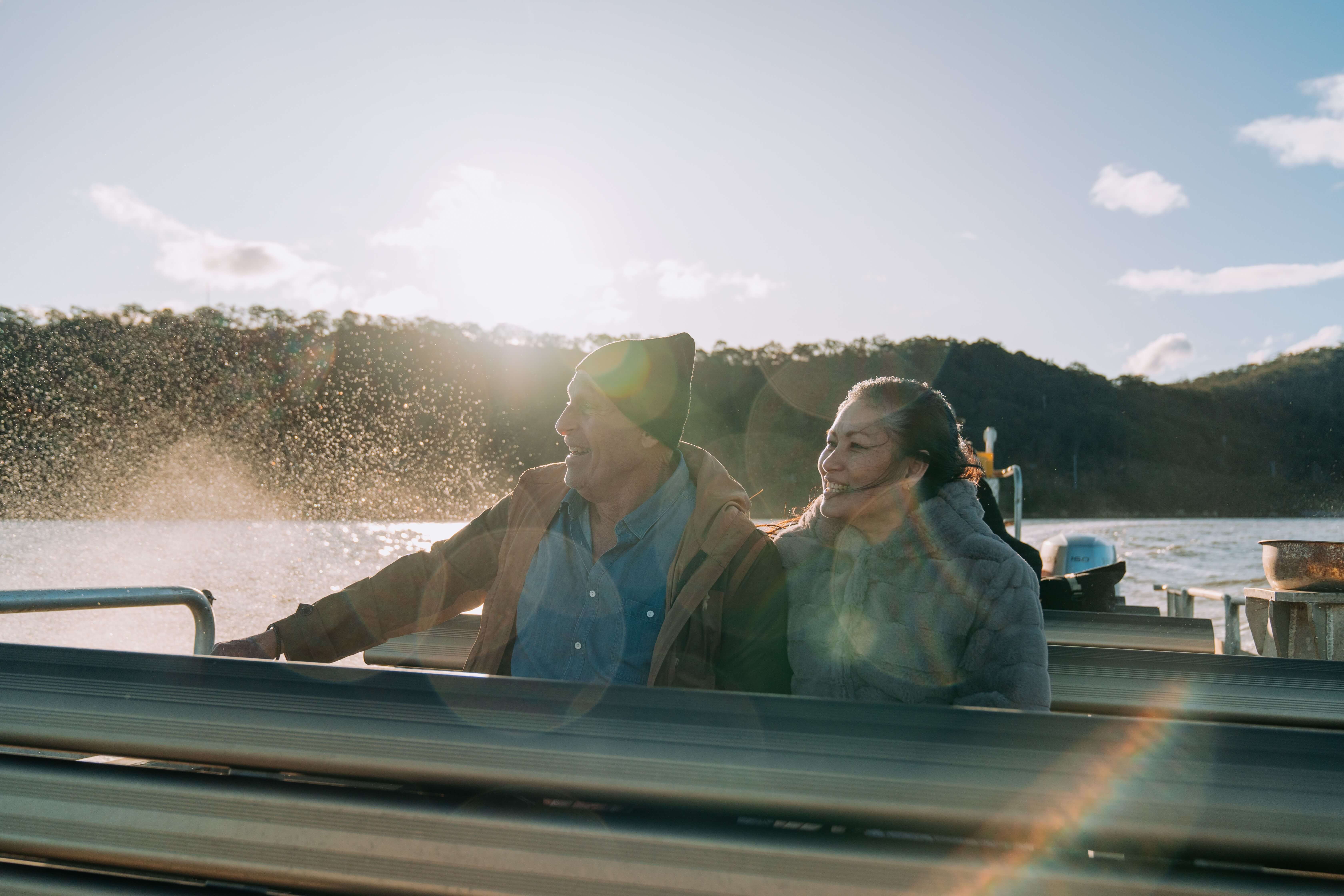 A couple on a boat in the water