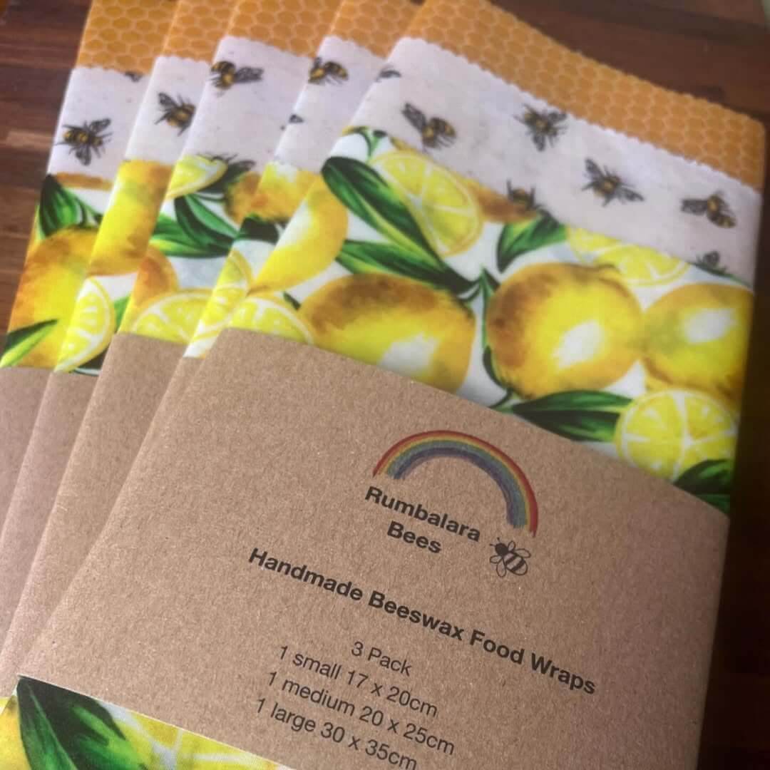 A collection of homemade beeswax wraps with a lemon print