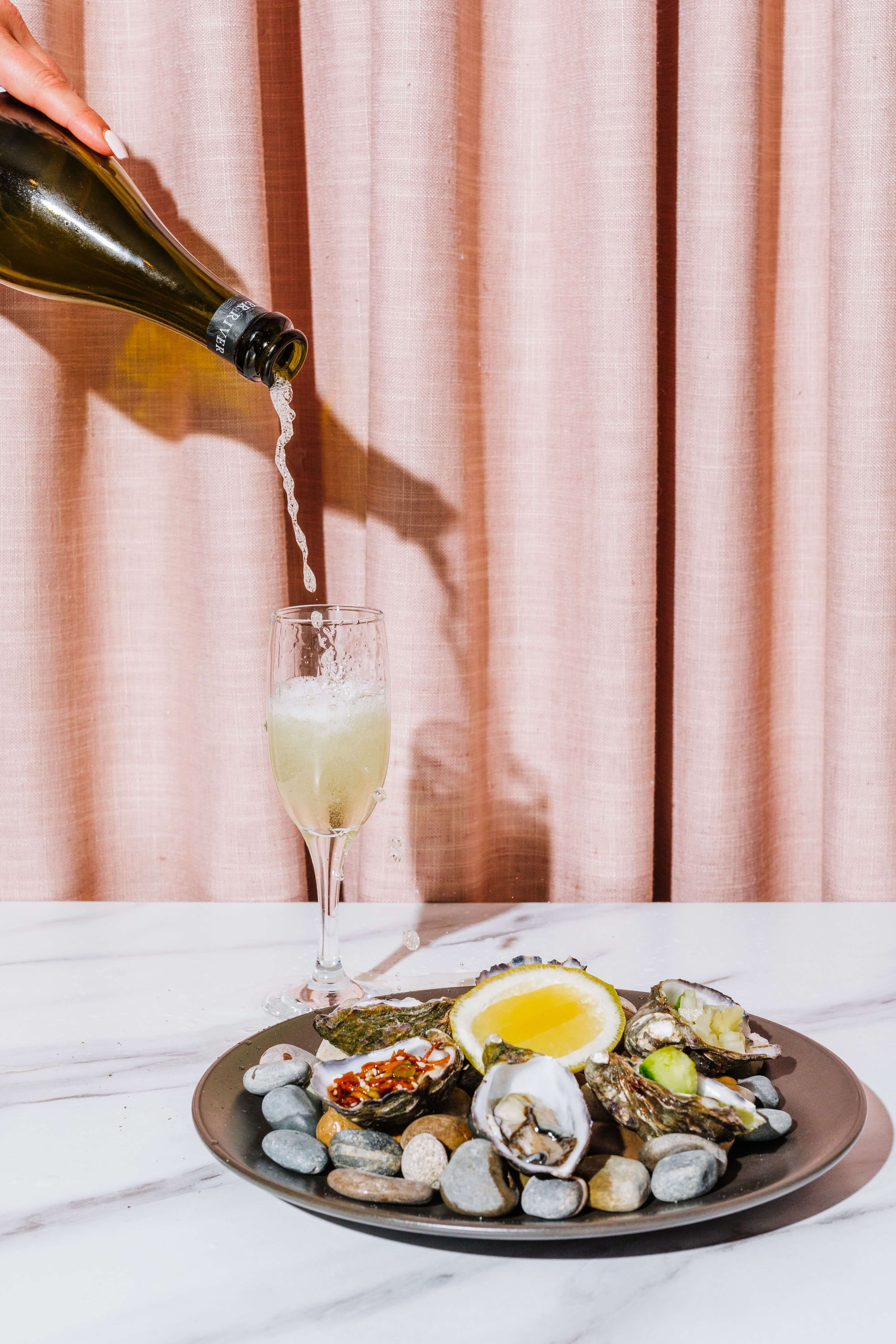 fancy plate of oysters and champagne