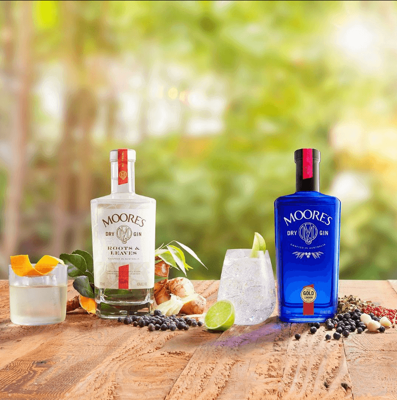 Two Gin bottles with glasses