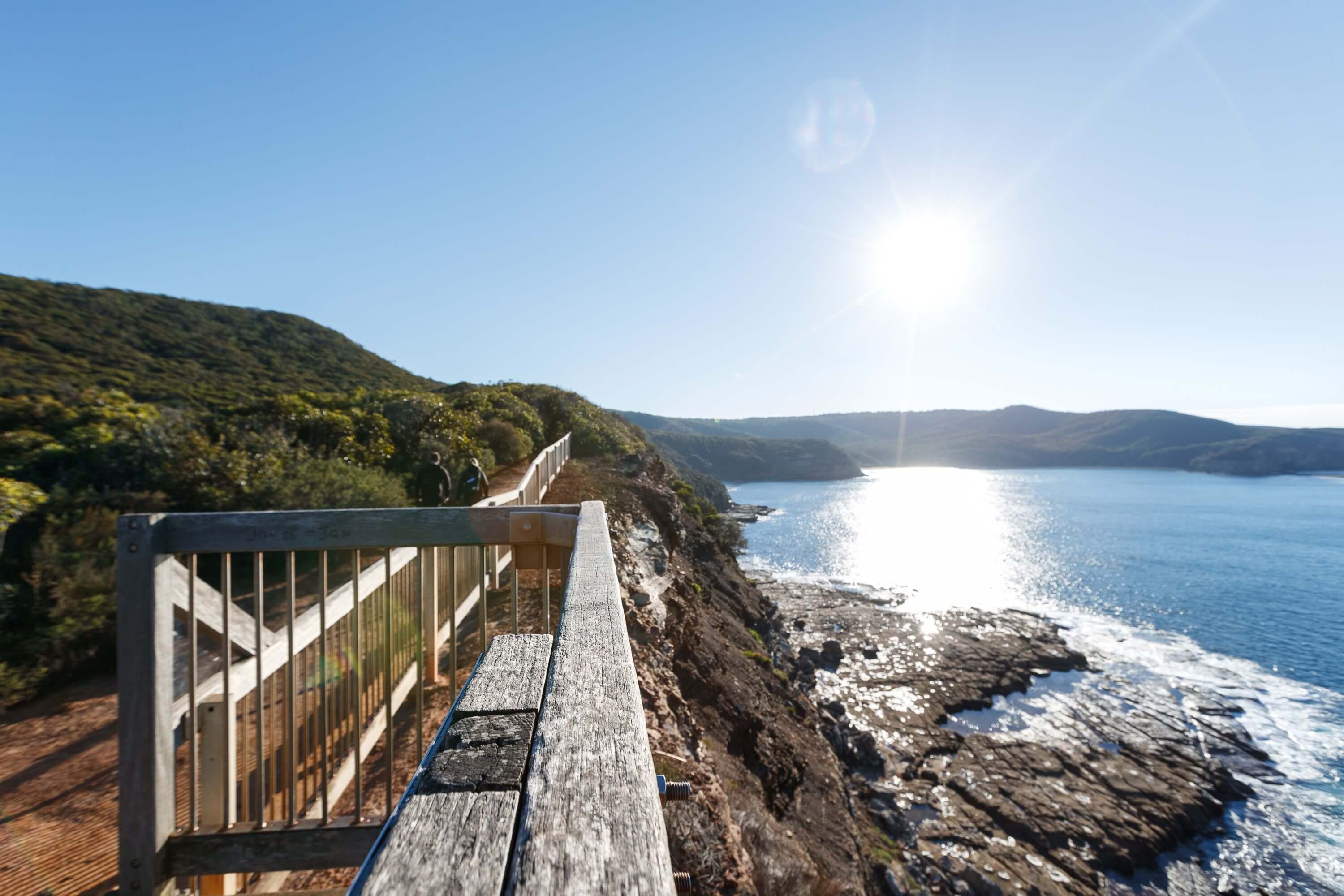 wooden boardwalk along coast to lookout