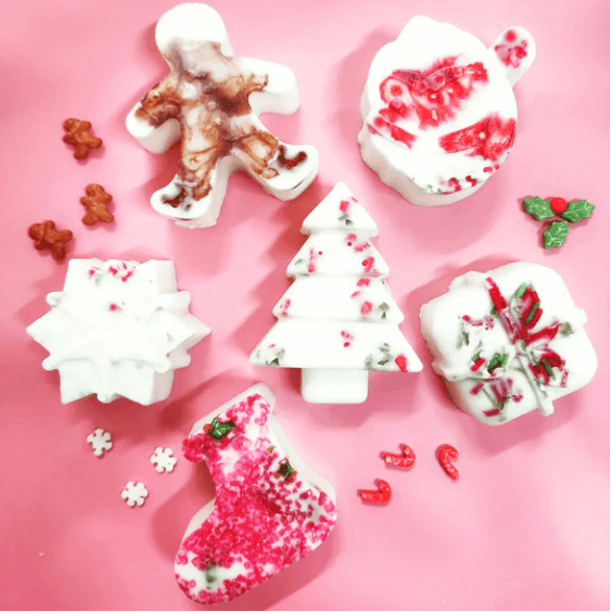 Christmas soaps on pink backgrounud