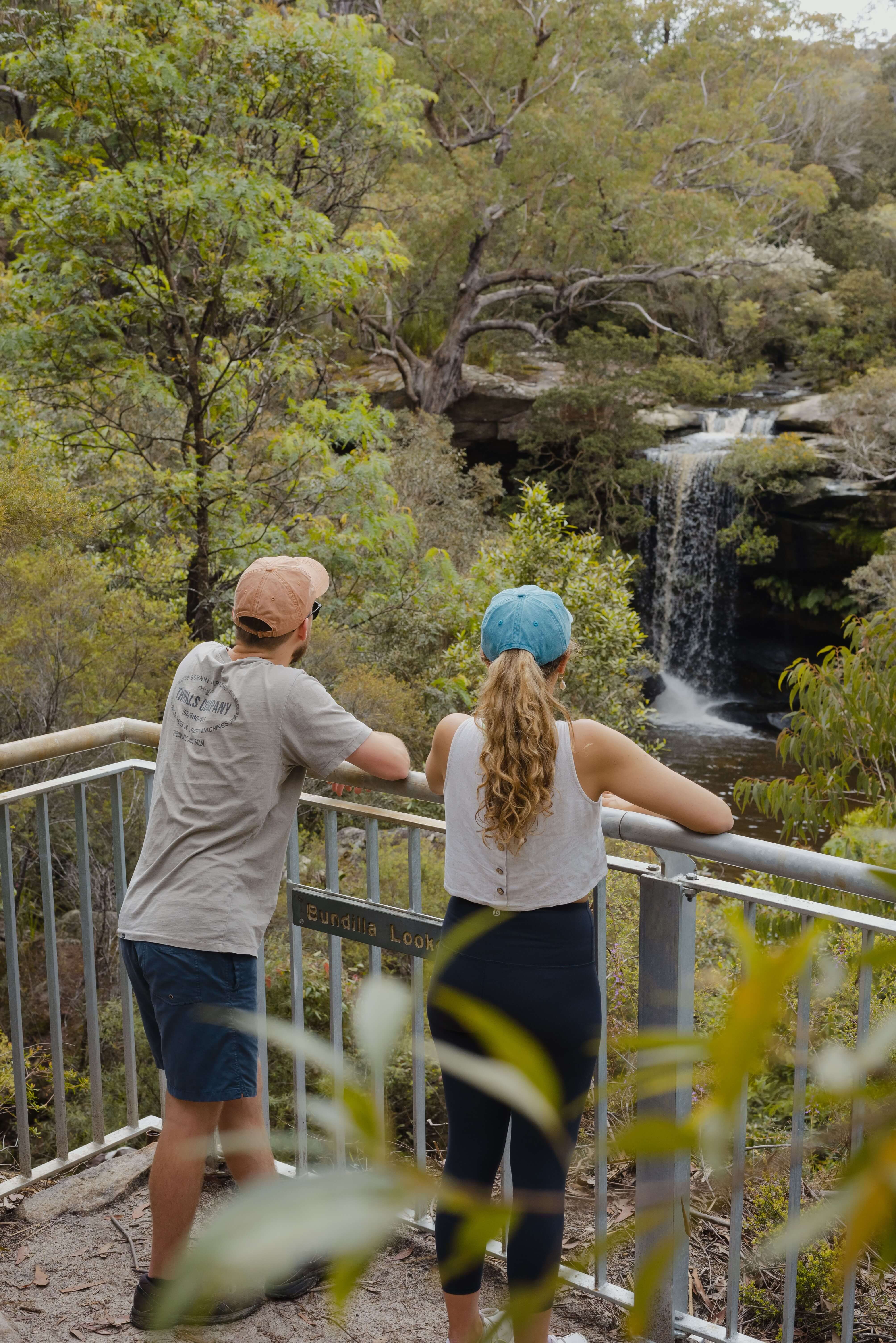 couple observing girrakool loop waterfall from lookout