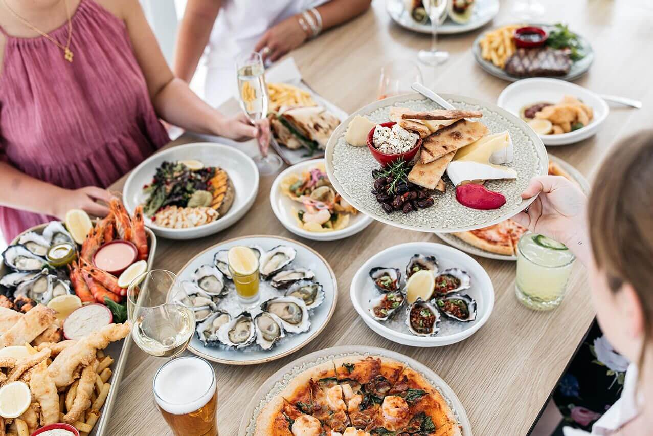 platter of food on table for a family