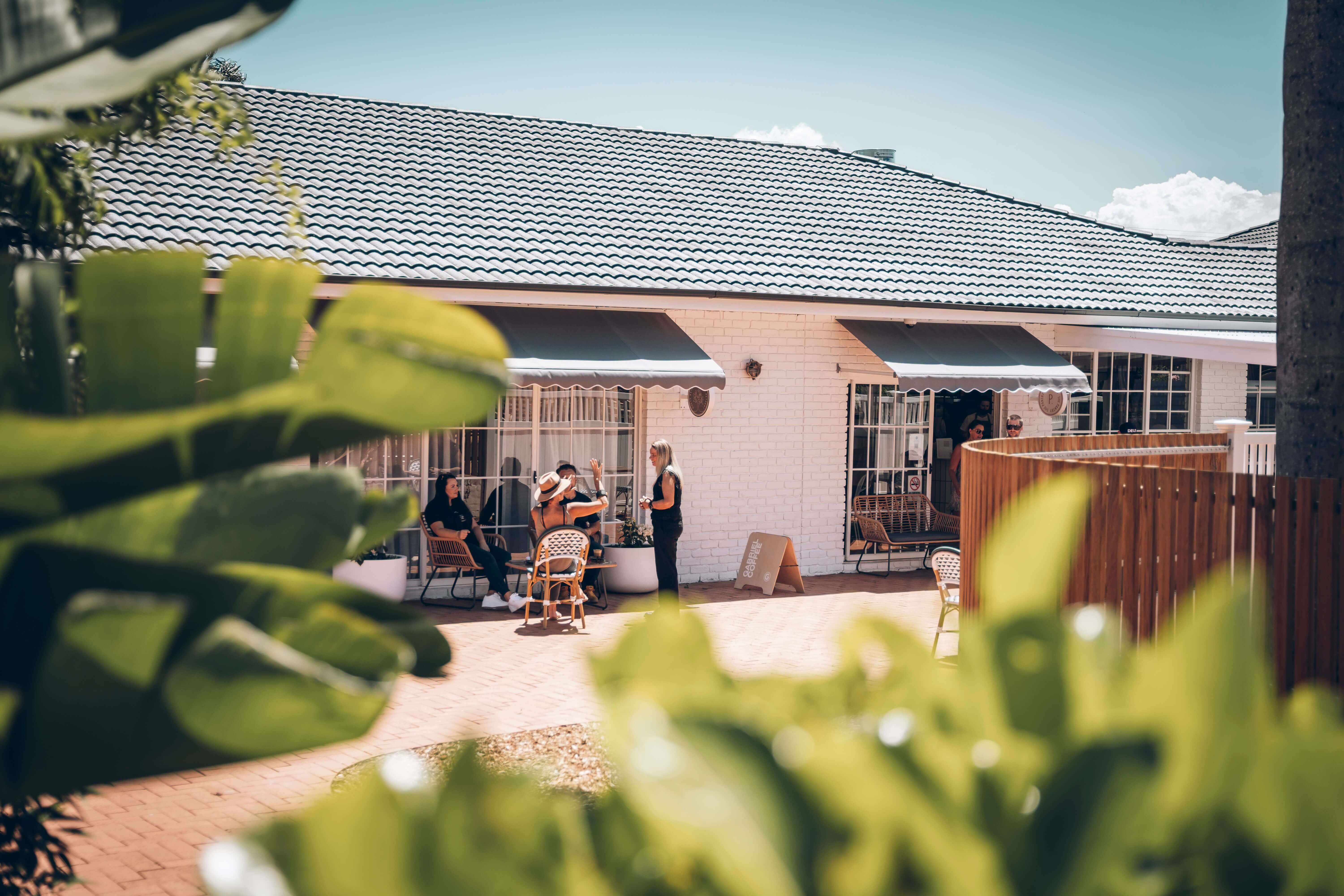 view of sunny outdoor cafe terrace