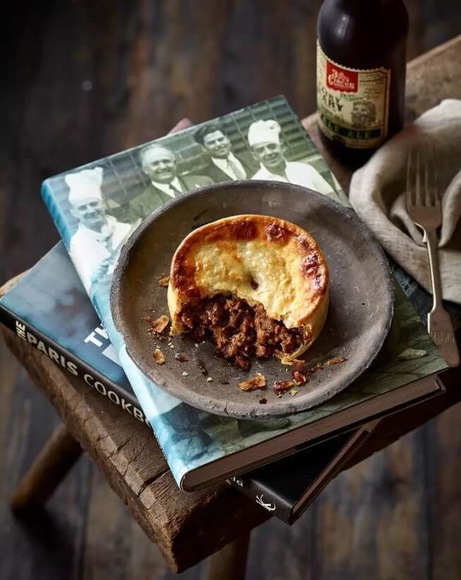 classy meat pie scene on plate
