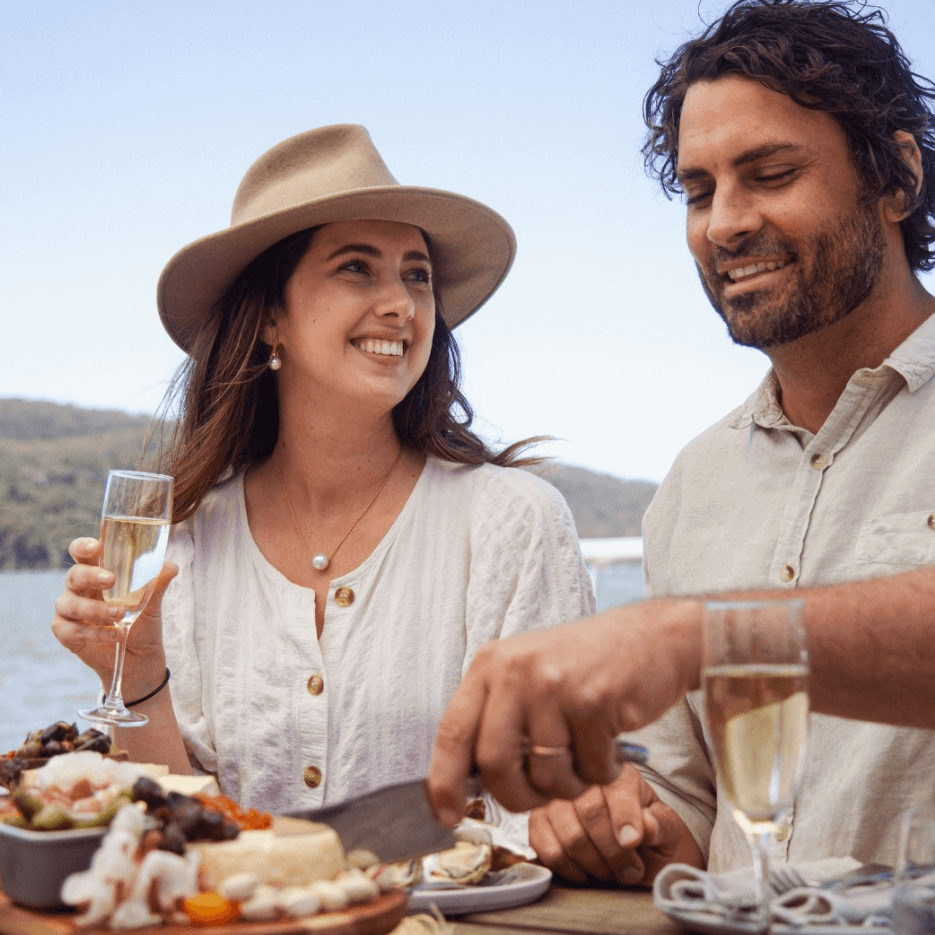 couple enjoying seafood hamper