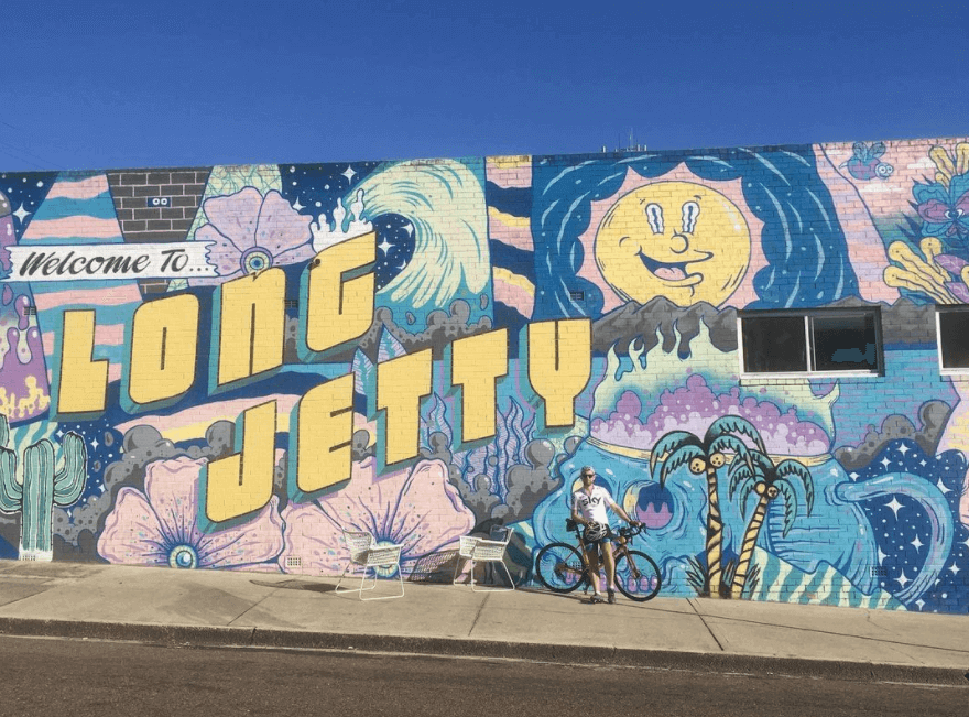 cyclist at long jetty mural