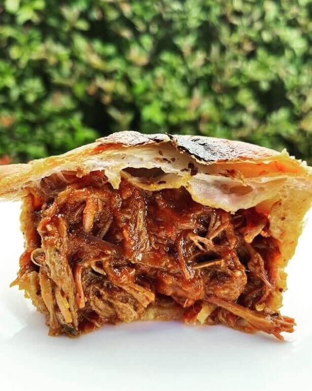 open meat pie with gourmet brisket filling