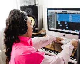 tessa thames working on music at desk