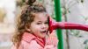 young girl at interactive playground 