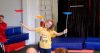 student performing the art of juggling plates