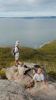 People on a clifftop overlooking Bouddi 