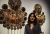 Gosford Art Gallery's EMERGING 2023 art prize winner Monica Rani Rudhar standing in front of her super sized earrings installation 